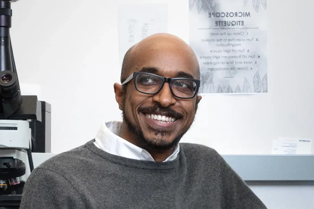 Assistant Professor of Biology Yasir Ahmed-Braimah smiling.