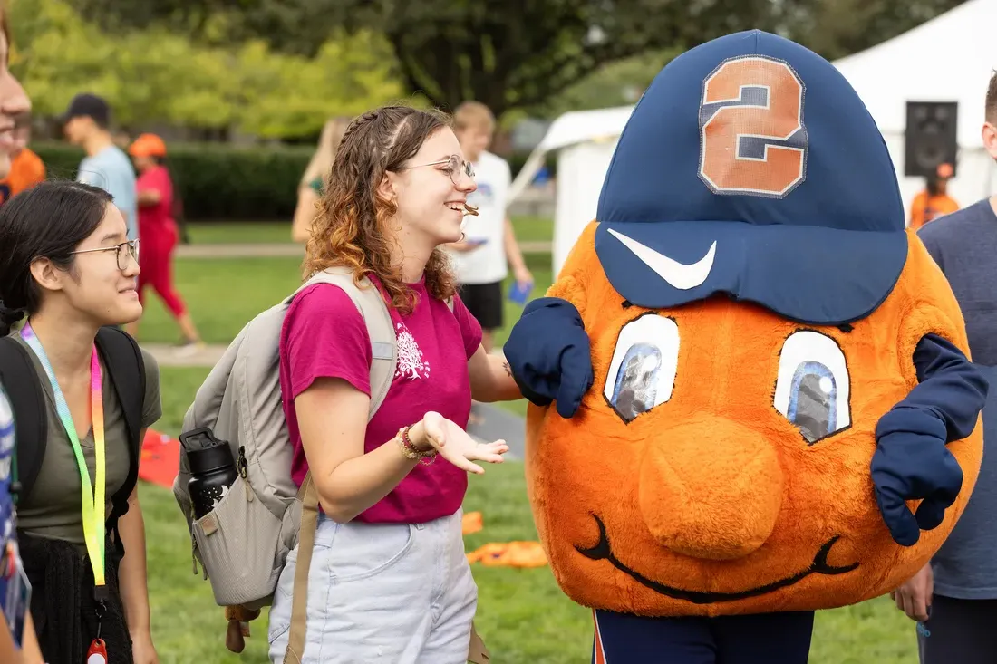 Students at Syracuse welcome event.